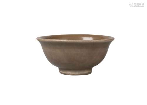 A Chinese Longquan celadon bowl, Yuan dynasty, 14th century, with thick celadon glaze over grey