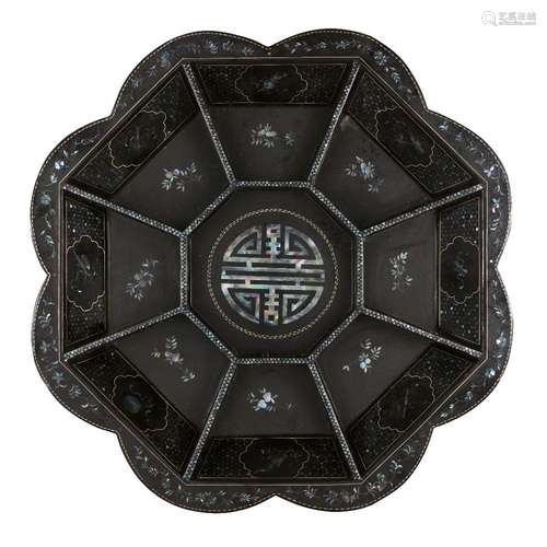 A Chinese black lacquer and mother of pearl inlaid food tray, early 20th century, centered with a