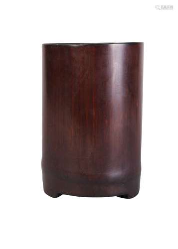 A Chinese bamboo brush pot, 19th century, of plain form, with three stepped feet, 17cm high 19世紀