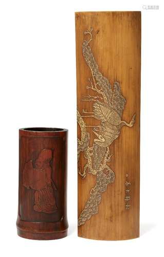 A Chinese bamboo wrist rest and brush pot, 20th century, the brush pot carved with Shou Lao and a