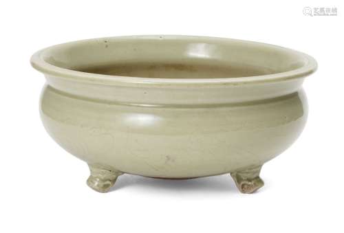 A Chinese grey stoneware celadon Longquan censer, Ming dynasty, incised to the exterior with