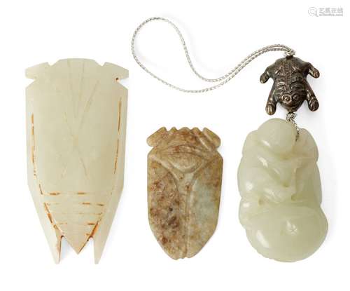 Three Chinese green hardstone carvings, 20th century, comprising two cicadas and a pendant carved