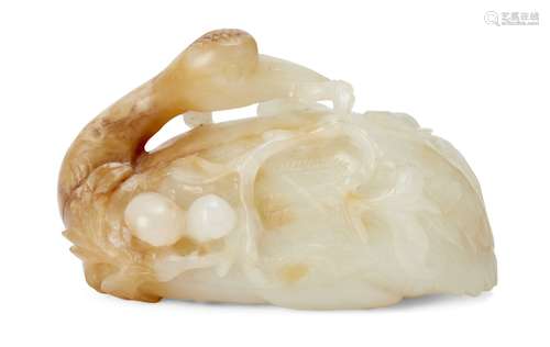 A Chinese pale green and russet jade carving of a crane, 18th century, finely carved in recumbent