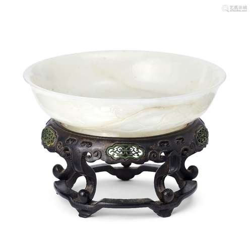 A Chinese white jade brushwasher, xi, Qianlong mark and of the period, carved to the interior in low