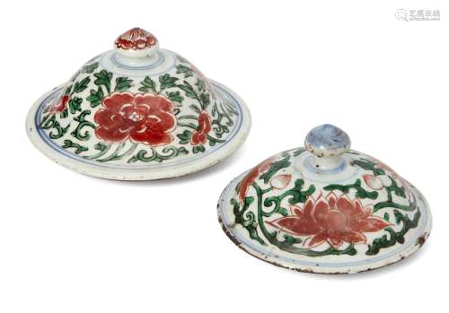 Two Chinese porcelain wucai covers, 17th century, painted with flowering lotus and peony scrolls,