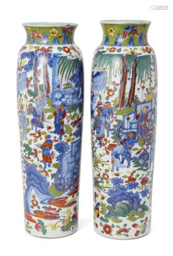 A pair of Chinese porcelain 'clobbered' sleeve vases, Transitional period, painted in underglaze