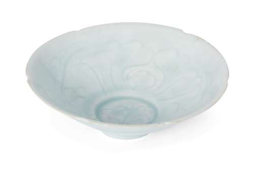 A Chinese qingbai porcelain lobed bowl, Song dynasty, carved to the interior with a continuous