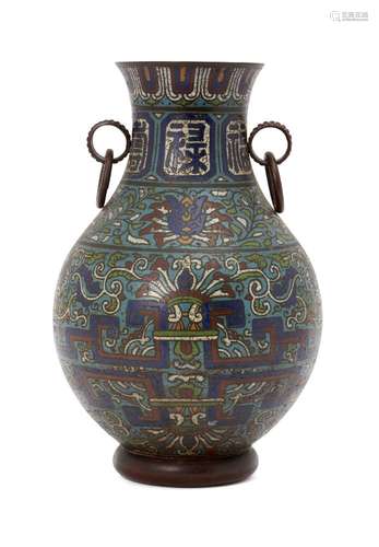 A Chinese bronze and champleve enamel vase, hu, 18th century, decorated to the blubous body with a