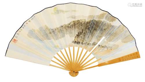 CHEN YONG (20TH CENTURY), ink and colour on paper fan with bamboo sticks, village within a