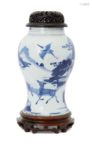 A Chinese porcelain yen yen vase, Kangxi period, painted in underglaze blue with two deer and two