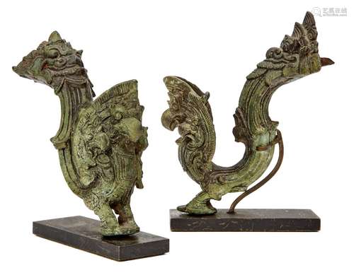 Two Khmer bronze antefixes, 12th century, cast as a mythical bird issuing from a mythical beast