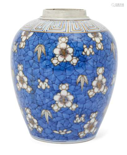 A Japanese porcelain jar, late 19th century, painted in underglaze blue and gilt highlighted with