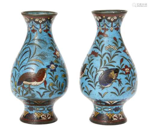 A pair of Japanese champleve enamel baluster vases, Meiji period, decorated with birds amongst