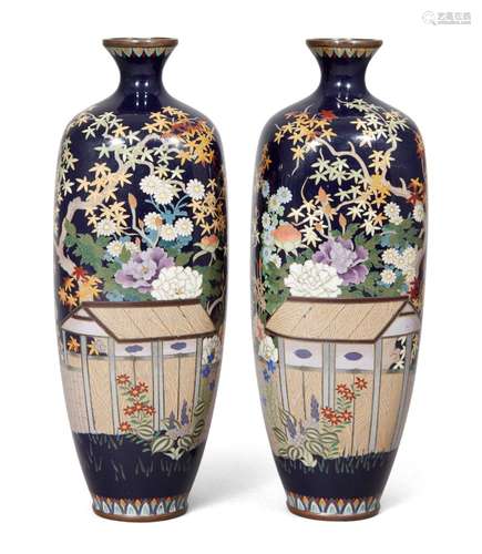 A pair of Japanese cloisonné enamel vases, Meiji period, with flared rims leading to tapering