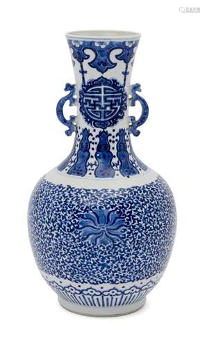 A Chinese porcelain bottle vase, 19th century, painted in underglaze blue with shou characters to