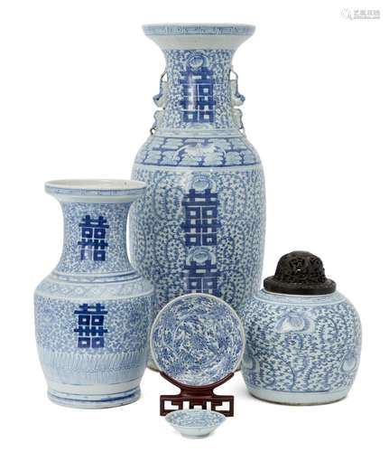 Five Chinese porcelain 'double happiness' pieces, 19th century, each painted in underglaze blue with