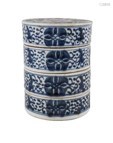 A Chinese porcelain four section stacking box, 19th century, painted in underglaze blue with