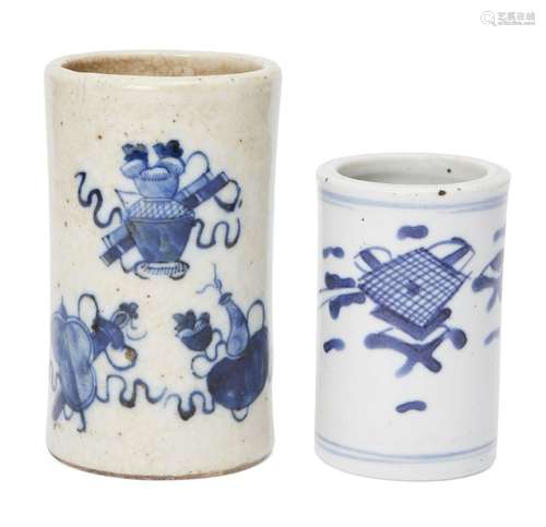 Two Chinese porcelain brush pots, late 19th/early 20th century, each painted in underglaze blue with