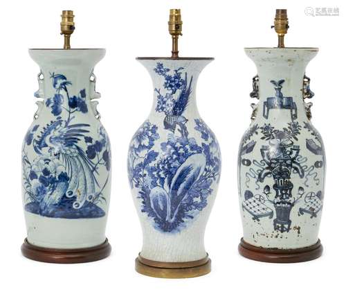 Two similar Chinese porcelain baluster vases, 19th century, painted in underglaze blue on a