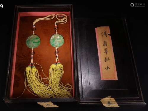 PAIR OF CARVED JADEITE PENDANTS