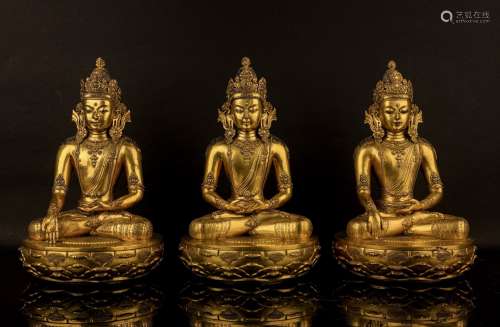 SET OF THREE GILT BRONZE SEATED BODHISATTVA