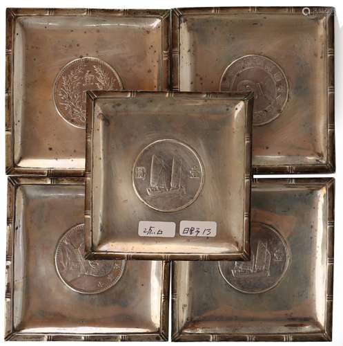 SET OF FIVE CHINESE SILVER COIN TRAYS