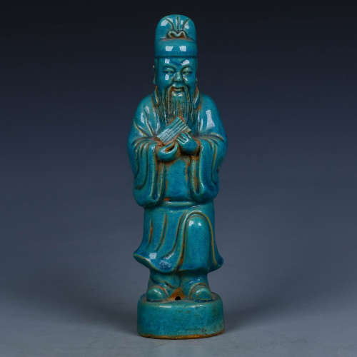 A Chinese Green Glazed Porcelain Figure