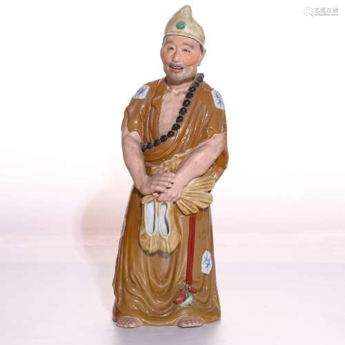 A Chinese Porcelain Figure of Monk Jigong