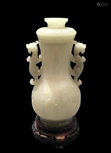 FINELY CARVED JADE VASE WITH DOUBLE HANDLE