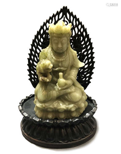 CARVED JADE GUANYIN ON STAND