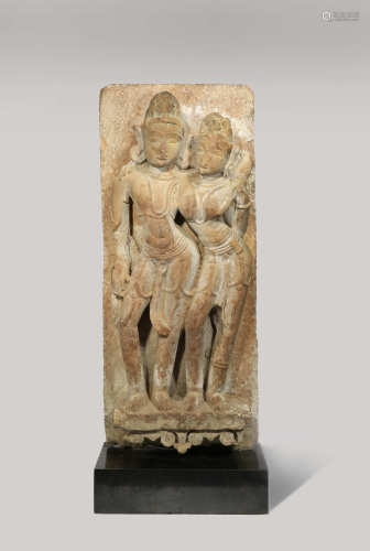 AN INDIAN SANDSTONE STELE OF A COUPLE
