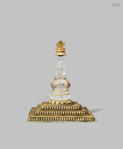 A NEPALESE ROCK CRYSTAL AND GILT-COPPER MODEL OF A STUPA