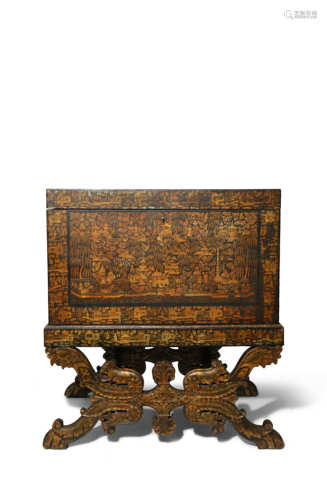 A LARGE INDO-EUROPEAN CHINOISERIE BLACK AND GOLD LACQUER RECTANGULAR CHEST AND STAND