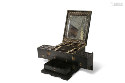 AN ANGLO-INDIAN EBONY VANITY SET