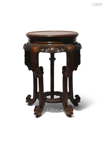 A CHINESE RETICULATED HARDWOOD STAND