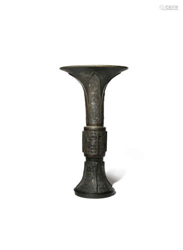 A CHINESE BRONZE GU-SHAPED VASE