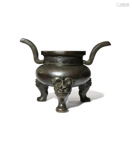 A CHINESE BRONZE TRIPOD INCENSE BURNER