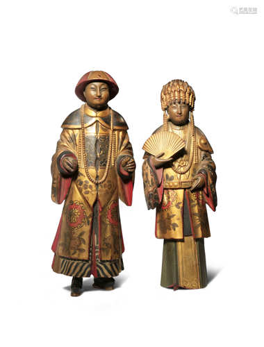 A PAIR OF CHINESE LACQUERED AND GILT-WOOD FIGURES