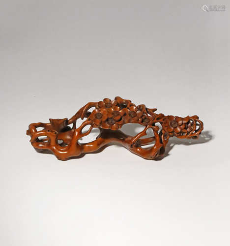 A CHINESE CARVED BOXWOOD BRUSH REST