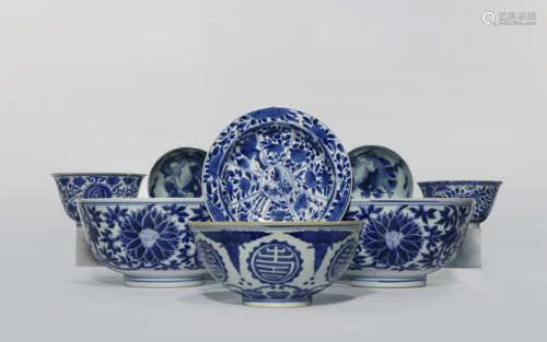 SEVEN CHINESE BLUE AND WHITE BOWLS AND A DISH