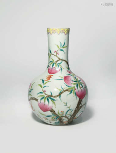 A CHINESE FAMILLE ROSE 'BATS AND PEACHES' BOTTLE VASE