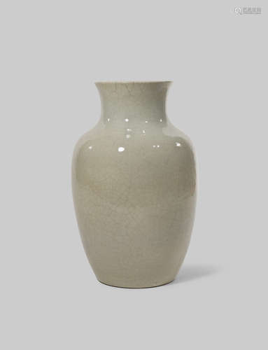 A CHINESE WHITE GLAZED ANHUA-DECORATED 'DRAGON' VASE