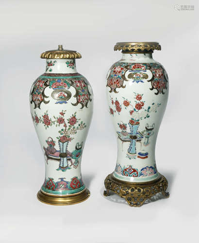 A NEAR PAIR OF CHINESE FAMILLE ROSE VASES