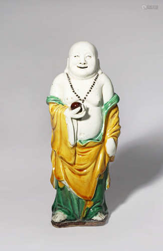 A CHINESE SANCAI FIGURE OF BUDAI HE SHANG