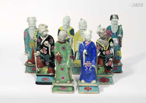 EIGHT CHINESE FAMILLE ROSE FIGURES OF DAOIST IMMORTALS