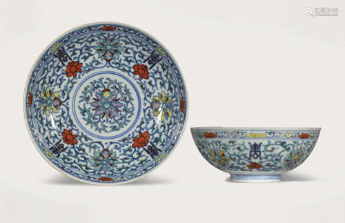 A CHINESE DOUCAI 'LONGEVITY' BOWL AND A SAUCER DISH