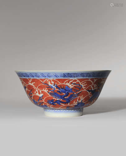 A CHINESE UNDERGLAZE BLUE AND IRON-RED ENAMELLED 'MYTHICAL BEASTS' BOWL