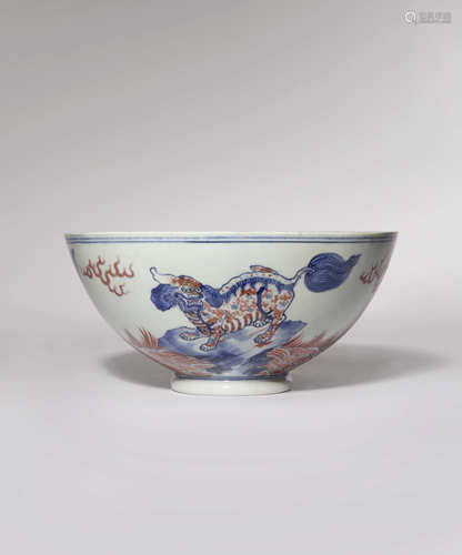 A CHINESE UNDERGLAZE BLUE AND RED 'MYTHICAL CREATURES' BOWL