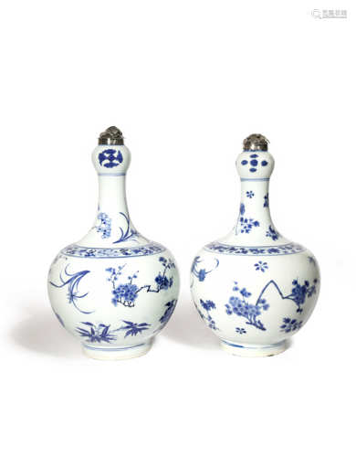 A NEAR PAIR OF CHINESE BLUE AND WHITE GARLIC-MOUTH VASES