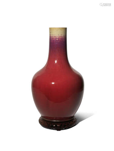 A CHINESE FLAMBE GLAZED BOTTLE VASE